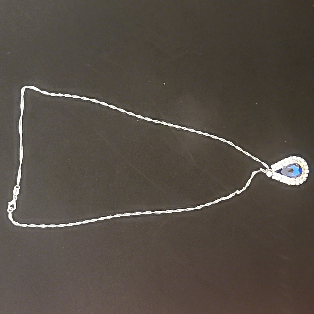 Elegant Silver Necklace with Blue Teardrop Pendant
